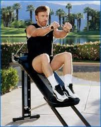 Chuck Norris Doing The Pullover Workout Photo by: www.queerty.com